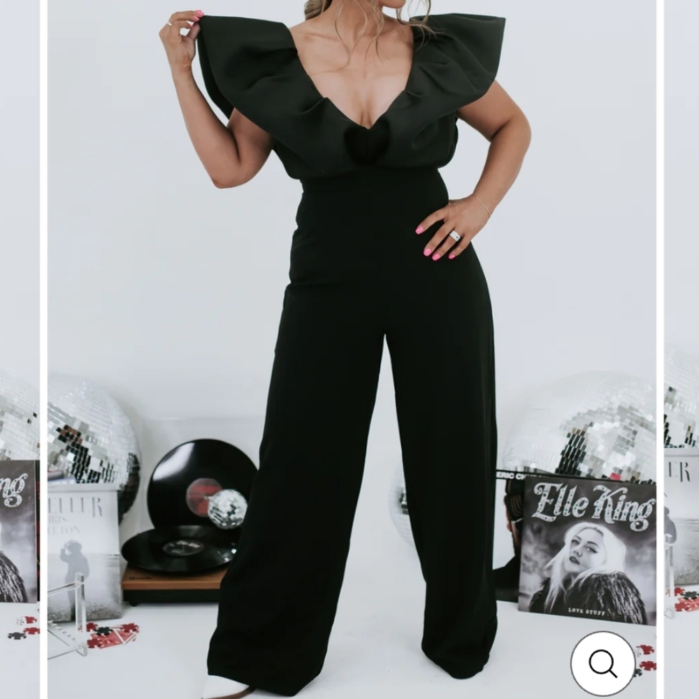 Exaggerated shoulder jumpsuit